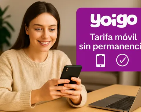 Mujer joven contratando tarifa móvil sin permanencia de Yoigo desde casa con el móvil